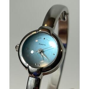 Women’s Silver Tone Bangle Watch with Light Blue Dial Quartz Movement